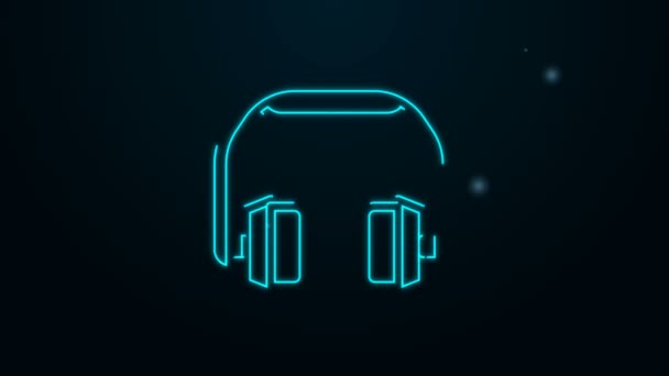 Leuchtende Neon-Line-Kopfhörer-Symbol isoliert auf schwarzem Hintergrund. Kopfhörer. Konzept zum Hören von Musik, Service, Kommunikation und Bedienung. 4K Video Motion Grafik Animation — Stockvideo