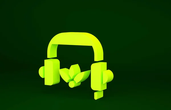 Gelbe Kopfhörer Für Meditation Isoliert Auf Grünem Hintergrund Minimalismus Konzept — Stockfoto