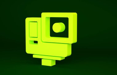 Sarı Eylem ekstrem kamera simgesi yeşil arkaplanda izole edildi. Ekstrem sporları çekmek için video kamera ekipmanı. Minimalizm kavramı. 3d illüstrasyon 3B canlandırma.