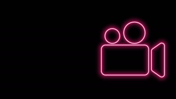 Glowing neon line Movie or Video camera icon isolated on black background. Cinema camera icon. 4K Video motion graphic animation — Stock Video