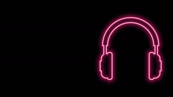 Linha de néon brilhante ícone de fones de ouvido isolado no fundo preto. Auriculares assinados. Objeto conceitual para ouvir música, serviço, comunicação e operador. Animação gráfica em movimento de vídeo 4K — Vídeo de Stock