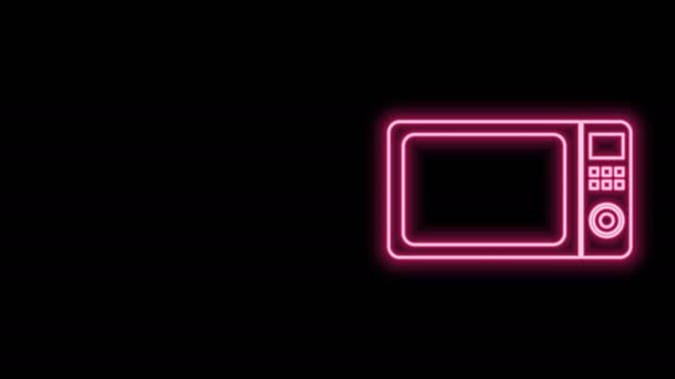 Glödande neon linje Mikrovågsugn ikon isolerad på svart bakgrund. Vitvaror ikon.4K Video rörelse grafisk animation — Stockvideo