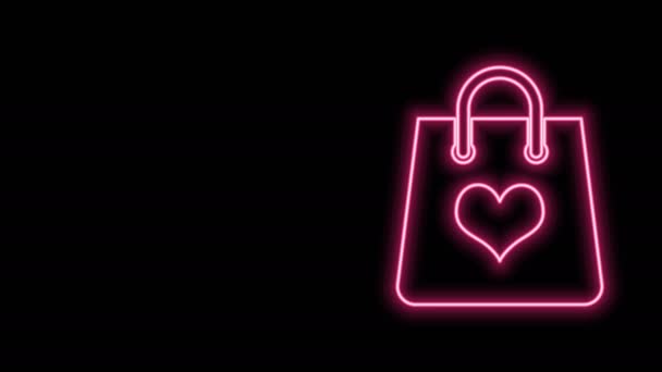 Glödande neon line Shopping väska med hjärta ikon isolerad på svart bakgrund. Shopping väska butik älskar som hjärta ikon. Alla hjärtans dag symbol. 4K Video motion grafisk animation — Stockvideo