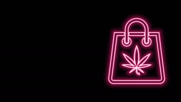 Gloeiende neon lijn Winkelpapieren zak met medicinale marihuana of cannabis blad icoon geïsoleerd op zwarte achtergrond. Wiet kopen. Hennep symbool. 4K Video motion grafische animatie — Stockvideo