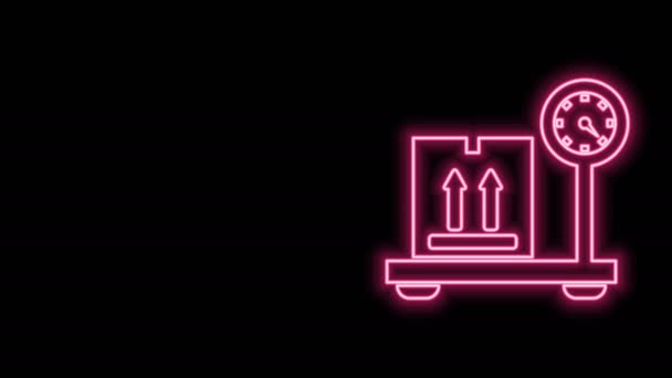 Glowing neon line Scale with cardboard box icon isolated on black background. Logistic and delivery. Weight of delivery package on a scale. 4K Video motion graphic animation — Stock Video