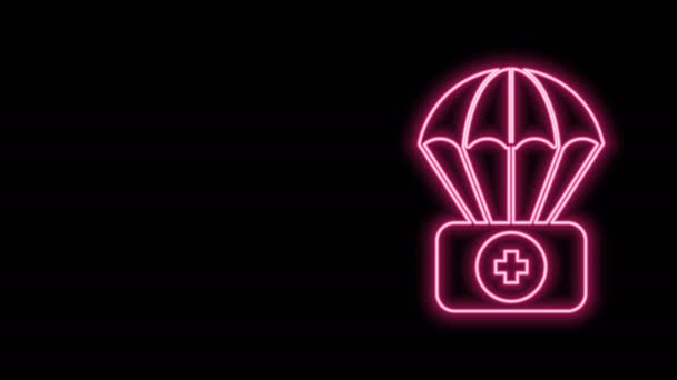 Gloeiende neon lijn Parachute met EHBO-kit pictogram geïsoleerd op zwarte achtergrond. Medische verzekering. 4K Video motion grafische animatie — Stockvideo