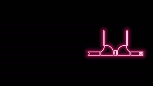 Leuchtende Neon-Linie BH-Symbol isoliert auf schwarzem Hintergrund. Frauenunterwäsche. 4K Video Motion Grafik Animation — Stockvideo