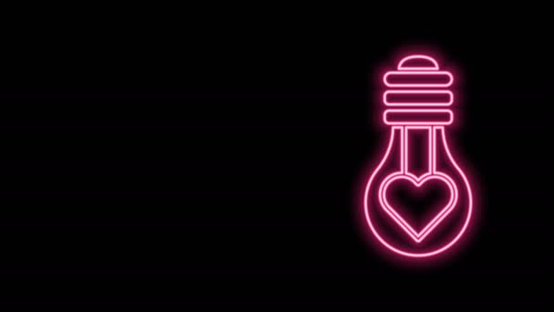 Gloeiende neon lijn Hartvorm in een gloeilamp icoon geïsoleerd op zwarte achtergrond. Liefdessymbool. Valentijnsdag symbool. 4K Video motion grafische animatie — Stockvideo