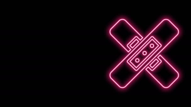 Zářící neonová čára Ikona překřížené obvazové omítky izolovaná na černém pozadí. Lékařská omítka, lepicí obvaz, flexibilní látkový obvaz. Grafická animace pohybu videa 4K — Stock video