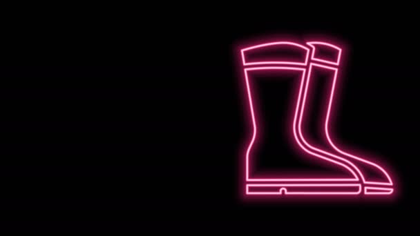 Ragyogó neon vonal Horgász csizma ikon elszigetelt fekete háttér. Vízálló gumicsizma. Gumicsizma esős időjáráshoz, horgászathoz, vadászathoz, kertészkedéshez. 4K Videó mozgás grafikus animáció — Stock videók