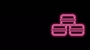 Parlayan neon çizgisi Macaron kurabiye ikonu siyah arkaplanda izole edildi. Makarna tatlı fırın. 4K Video hareketli grafik canlandırması