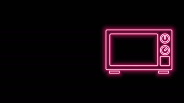 Glowing neon line Microwave oven icon isolated on black background. Home appliances icon. 4K Video motion graphic animation — Stock Video