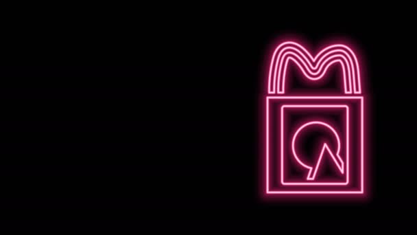 Glowing neon line Paper shopping bag icon isolated on black background. Package sign. 4K Video motion graphic animation — Stock Video