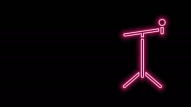 Siyah arka planda izole edilmiş, parlak neon hattı simgesi olan mikrofon. 4K Video hareketli grafik canlandırması