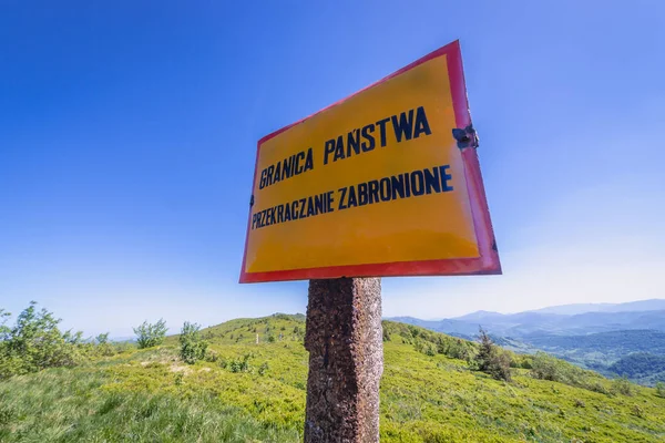 Sign on a Poland and Ukraine border in Bieszczady Mountains National Park, Poland with a warning - State border. Crossing is prohibited