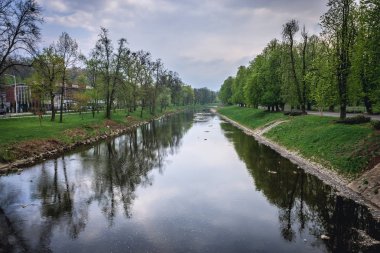 View on the Olsa River, separating Cesky Tesin town in Czech Repblic and Cieszyn town in Poland clipart