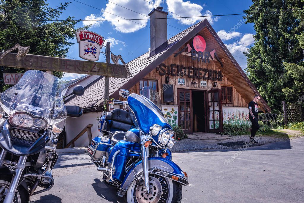 Cisna, Poland - May 13, 2018: Entrance of Siekierezada Bar in Cisna, small village in Bieszczady mountain range in Subcarpathian region