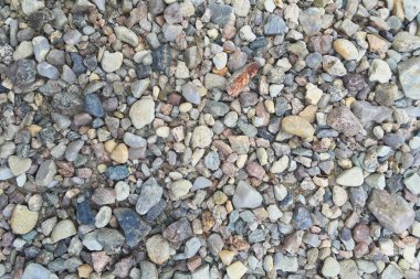 Kuru yuvarlak yeniden işlenebilir taşlarla soyut arkaplan