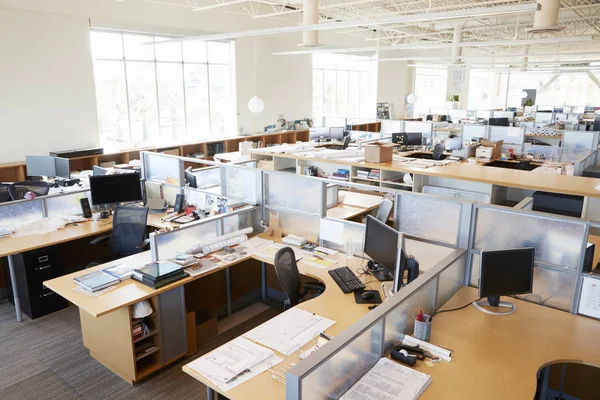 Partitioned computer workstations in open plan office