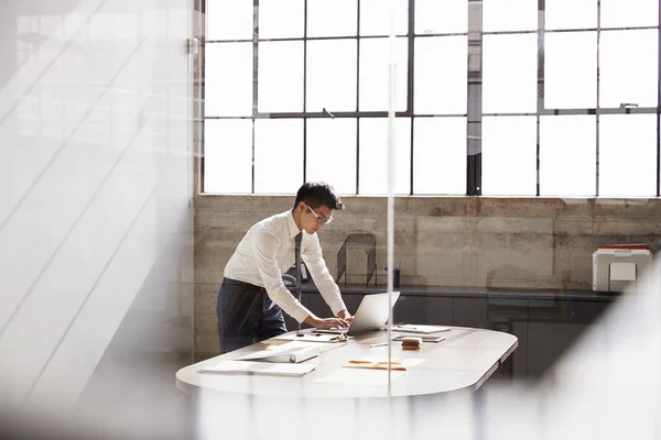 Businessman Working Alone Office Seen Window — Stock Photo, Image