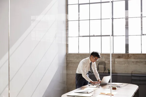 Businessman Working Alone Office Seen Window — Stock Photo, Image