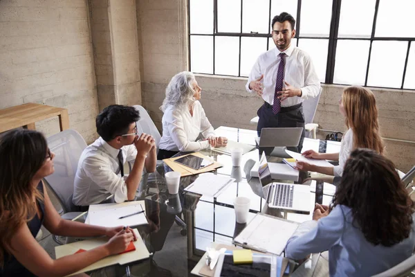 Businessman Addressing Colleagues Meeting Elevated View — Stock Photo, Image