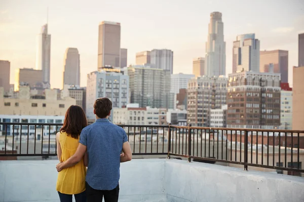Rear View Couple Rooftop Terrace Looking Out City Skyline Sunset — Stock Photo, Image