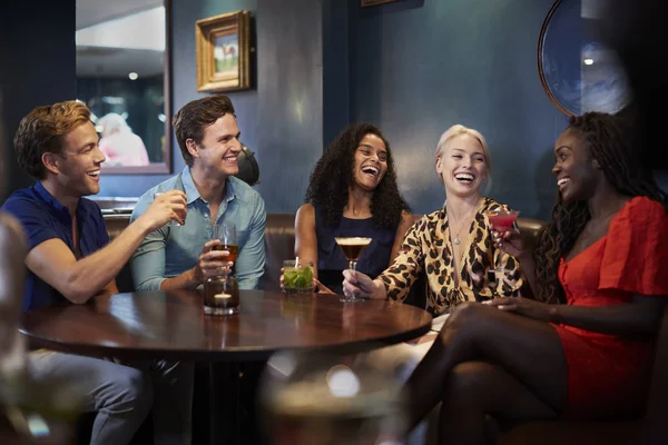 Group Young Friends Sitting Table Bar Together Night Out — Stock Photo, Image