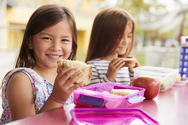 Young Schoolgirls Holding Sandwiches School Lunch Table — Stock Photo, Image