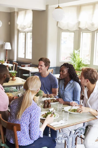 Group Friends Sitting Table Restaurant Enjoying Meal Together — Stock Photo, Image