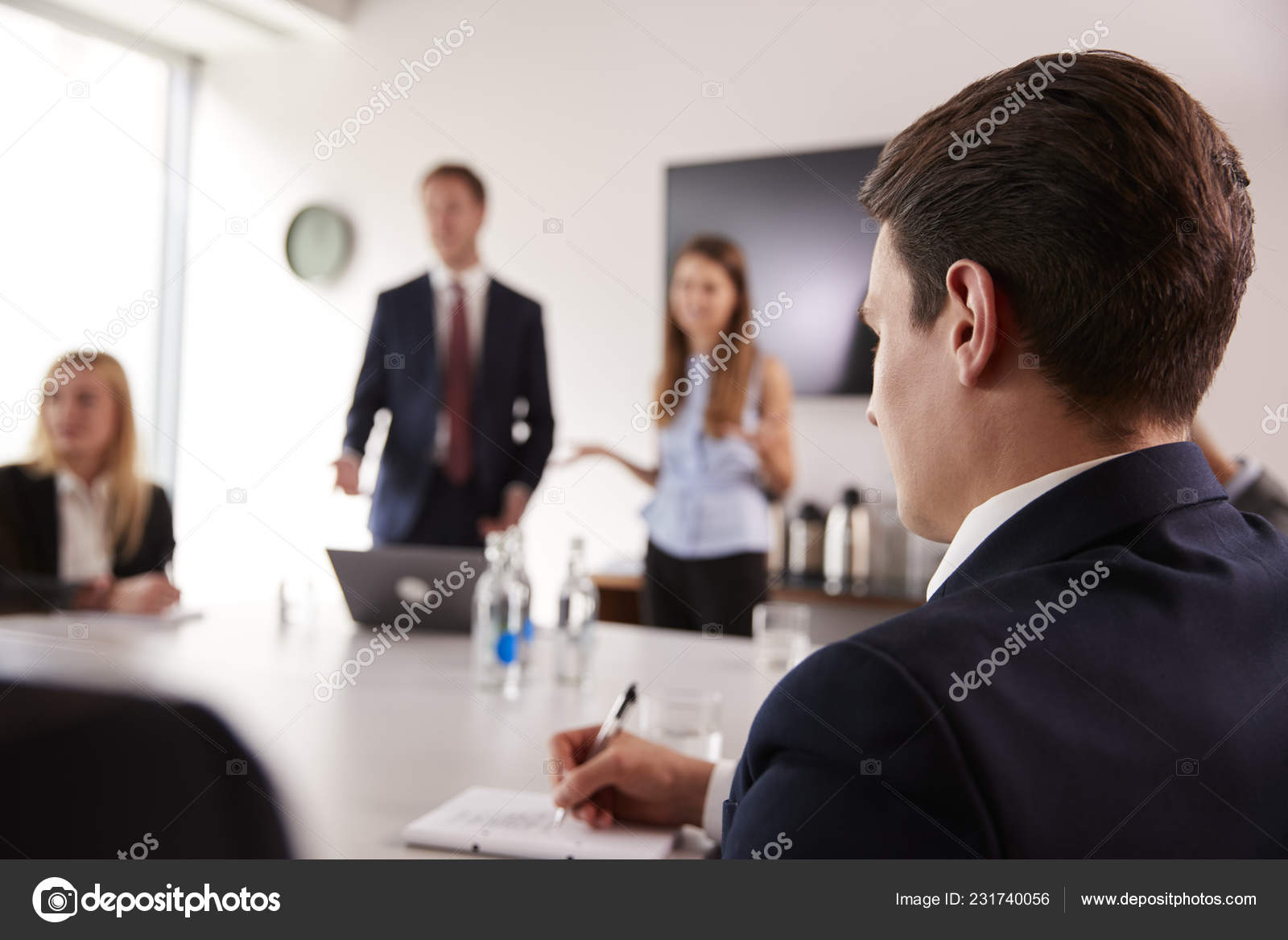 Businessman Making Notes Group Meeting, Round Table Phone Notation