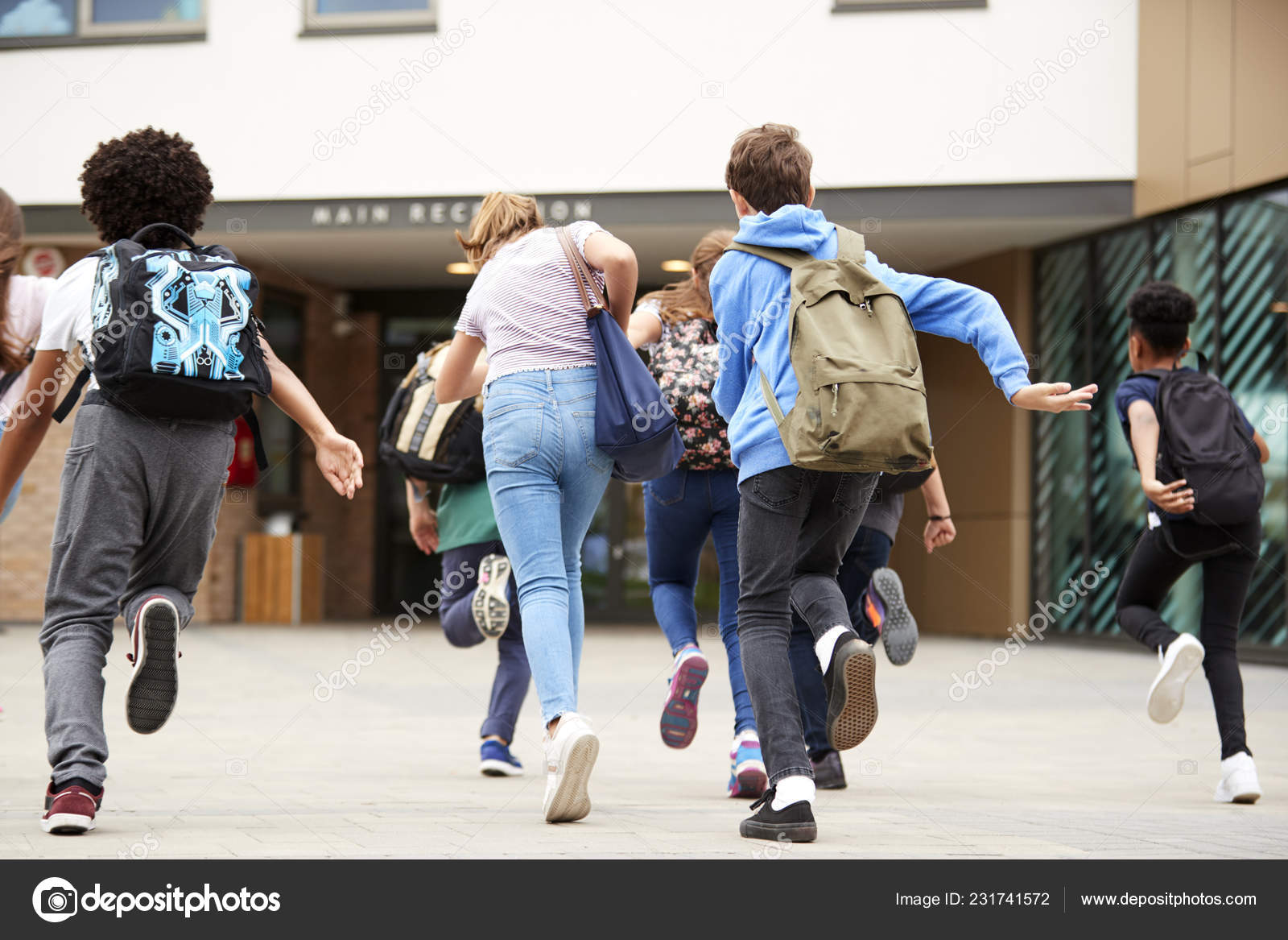 Group High School Students Running School Building Beginning Class