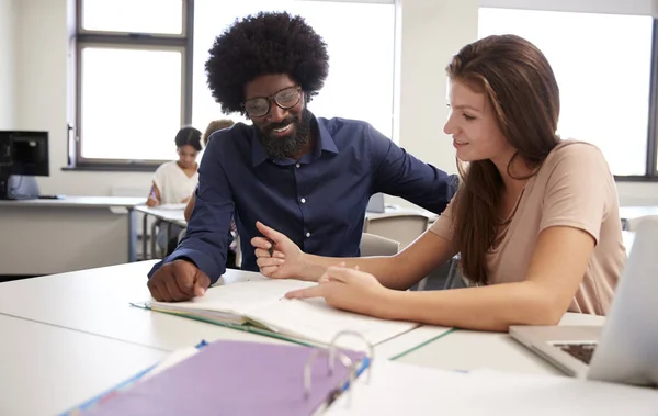 High School Tutor Giving Female Student One One Tuition Desk — Stock Photo, Image