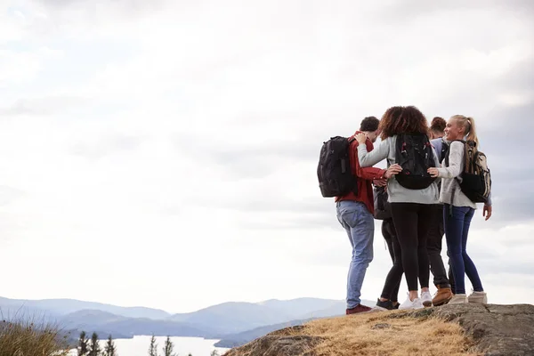 Group Five Mixed Race Young Adult Friends Embracing Arriving Summit — Stock Photo, Image