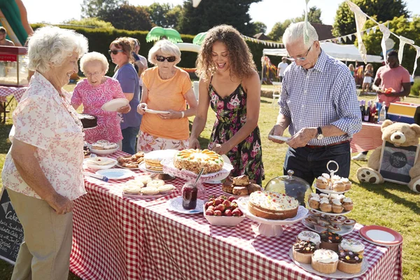 Table Sweet Cakes Desserts Backyard Picnic People Enjoying Food Royalty Free Stock Images