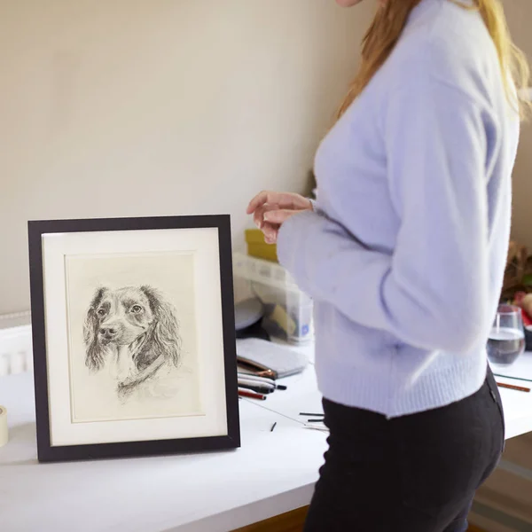 Close Female Teenage Artist Framing Charcoal Drawing Dog Studio — стоковое фото