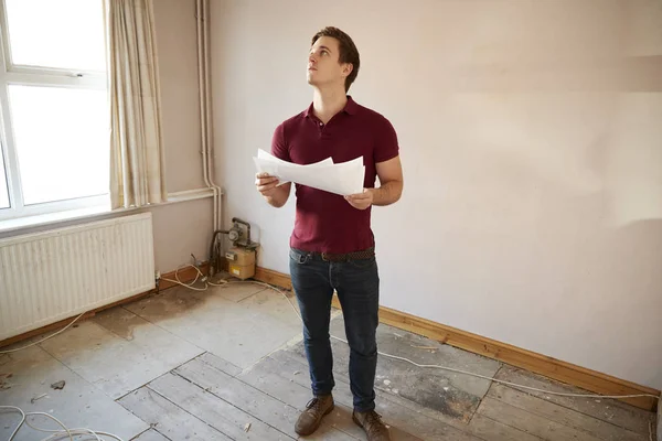 Male First Time Buyer Looking House Survey Room Renovated — Stock Photo, Image