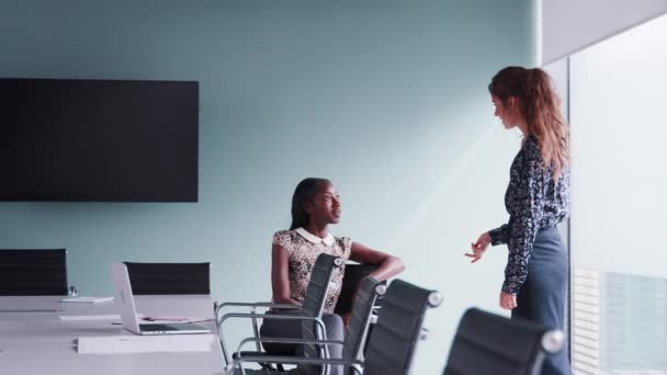 Side View Two Casually Dressed Businesswomen Sitting Boardroom Having Informal — Stock Video