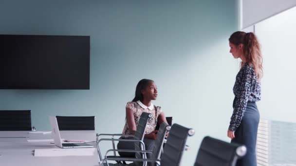 Side View Two Casually Dressed Businesswomen Sitting Boardroom Having Informal — Stock Video