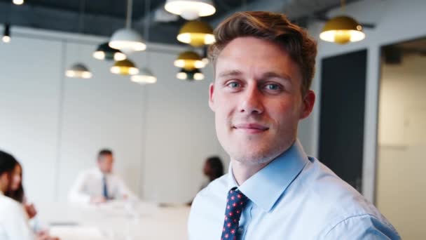 Portrait Young Businessman Standing Boardroom Table Meeting Background Shot Slow — Stock Video