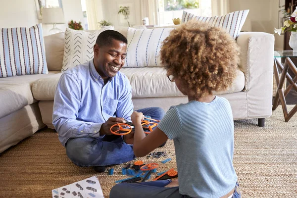 Back View Granddaughter Sitting Cross Legged Floor Her Grandfather Living — Stock Photo, Image