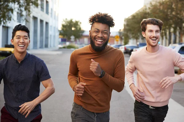 Three Hip Young Adult Male Friends Running Fun City Road — Stock Photo, Image
