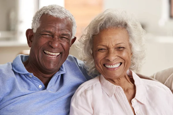 Portrait Loving Senior Couple Sitting Sofa Home Together — Stock Photo, Image