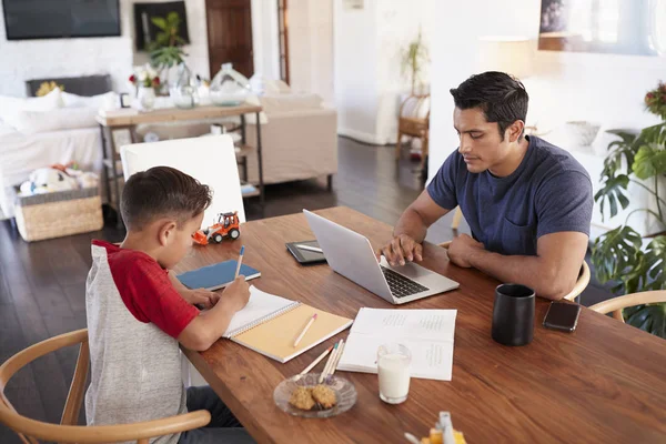 Hispanic Father Son Working Each Other Dining Room Table Elevated — Stock Photo, Image