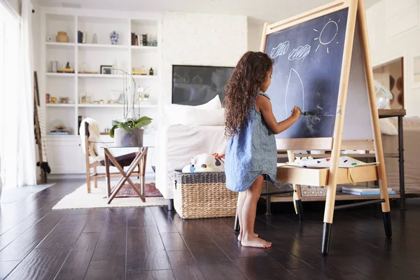 Young Hispanic Girl Drawing Chalks Blackboard Living Room Home Full — Stock Photo, Image