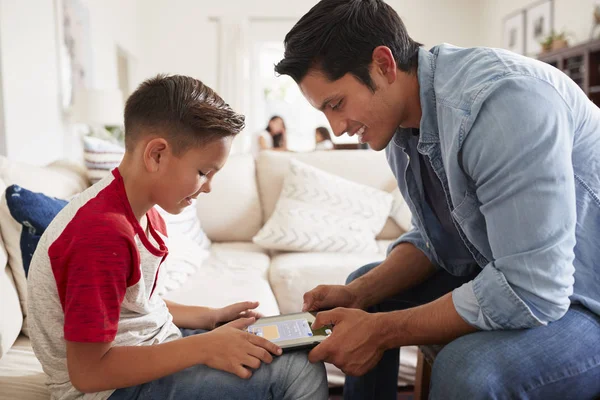 Pre Teen Boy Playing Game Tablet Computer Dad Sitting Room — Stock Photo, Image