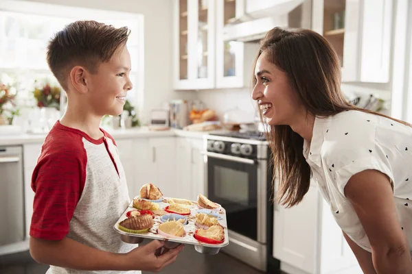 Pre Teen Hispanic Boy Presenting Cakes His Proud Mother Close — Stock Photo, Image