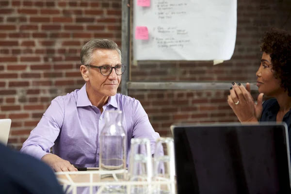 Mature Businessman Leading Office Meeting Colleagues Sitting Table — Stock Photo, Image