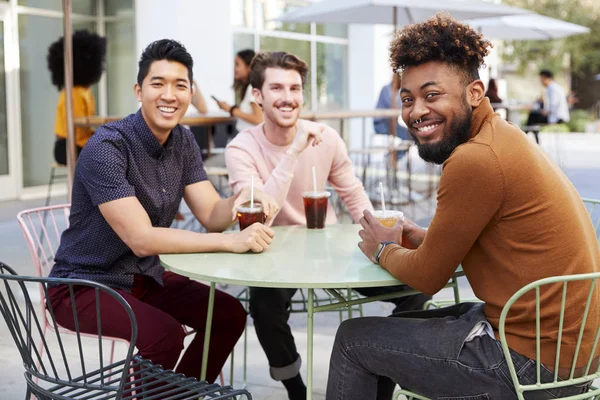 Three Millennial Male Friends Talking Cold Brews Cafe City Street — Stock Photo, Image