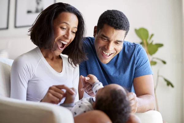 Happy Mixed Race Young Adult Parents Playing Three Month Old — Stock Photo, Image